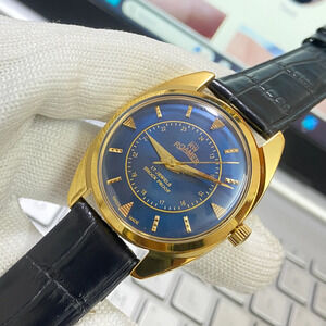 Vintage 1980 Roamer Manual Mens Gold Watch W/Leather Strap & Blue accents